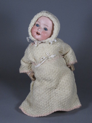 A German porcelain headed doll with open eyes, open mouth  with tongue, the head incised Heubach KPK? 300.2/0 Germany  and 1 other porcelain headed doll with open and shutting eyes,  open mouth with 2 teeth, the head incised Made in Germany  62, af,  ILLUSTRATED