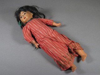 An Armand Marseille standing Indian doll 12"