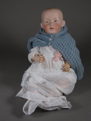 A German porcelain doll the head incised 7 Germany, 14"