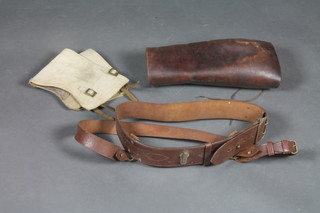A brown leather Sam Brown belt, pair of brown leather gaiters and a pair of webbing gaiters