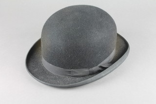 A gentleman's black bowler hat by Lock & Co
