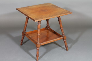 A Victorian square walnut 2 tier occasional table, raised on  turned supports 22"