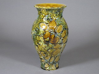 A Doulton Lambeth vase decorated leaves, the base incised  GCLB 9"