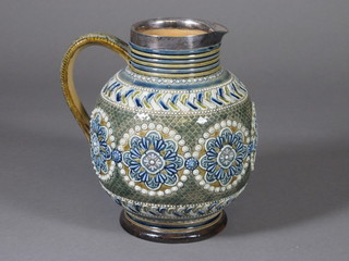 A Doulton Lambeth salt glazed jug with silver collar, the base incised 1878 7"