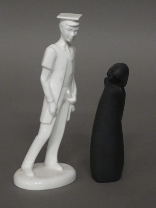 A Royal Doulton figure - Graduate Male and 1 other