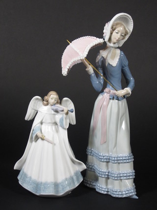 A Lladro figure of a standing violinist, base marked Lladro 7",  bow f, and 1 other Lladro figure of a standing lady with parasol,  base incised 4870 12"