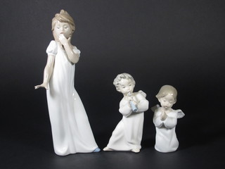 2 Lladro figures Angels 5" and 6" and a Nao figure of a standing girl 11"