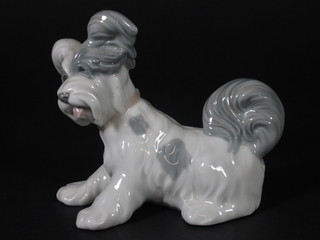 A Lladro figure of a seated dog 4"