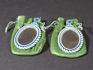 A pair of miniature Lladro hand mirrors 4"