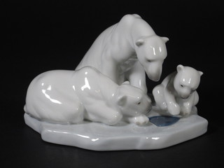 A Lladro figure group of polar bears at the watering hole, base marked 1443 4"