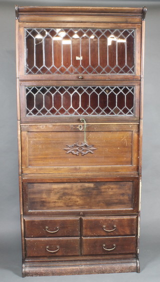 An Edwardian mahogany 5 tier Globe Wernicke style secretaire bookcase, the upper section enclosed by lead glazed panelled  doors with secretaire revealing a fall front, the base fitted 4 short  drawers 34"