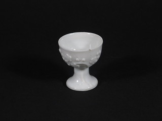 An Oriental blanc de chine porcelain cup raised on a circular spreading foot 2"