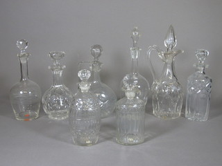 2 glass ewers and 6 various decanters