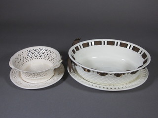 A Leeds classic cream ware circular twin handled basket and stand 6" together with an oval Wedgwood dish and stand 10"