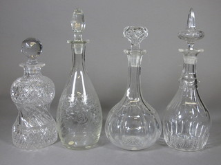 An etched glass club shaped decanter and 3 cut glass decanters