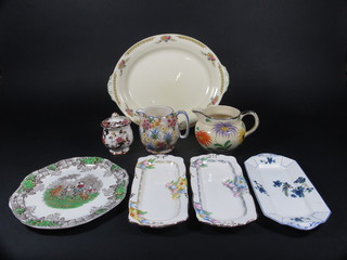 A Mandalay pattern preserve jar and cover 4", an Arthur Price floral pattern jug 4 1/2", a Royal Winton Marguerite patterned  jug 4", a Copeland Spode circular segmented plate 10", 3  rectangular sandwich plates and an oval twin handled pottery  plate with floral decoration 15"