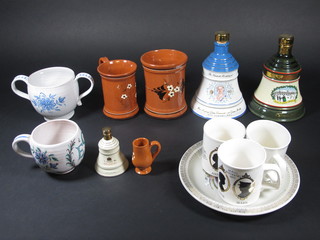 A brown glazed Art Pottery tankard, other Art Pottery tankards and a collection of commemorative china