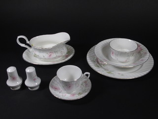 A 34 piece Royal Staffordshire dinner service comprising 6 10" dinner plates, 6 8" soup bowls, sauce boat and stand, salt and  pepper pot, 6 6 1/2" tea plates, sugar bowl, 5 saucers and 6  cups