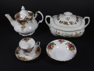 A 37 piece Royal Albert Old Country Rose pattern dinner/tea  service comprising 6 dinner plates, 6 bowls, 6 side plates, 6  cups, 6 saucers, teapot, milk jug, sugar bowl, sandwich plate,  cake plate and 2 mugs together with 2 Adams Country Meadow  pattern tureens and covers