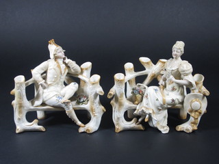 A pair of 19th Century spill vases in the form of garden benches  with seated lady and gentleman 6"