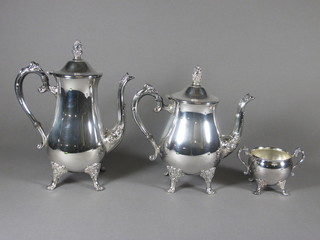 A silver plated 4 piece tea/coffee service comprising teapot, twin handled sugar bowl and cream jug