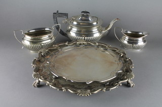 A 3 piece silver plated tea service with demi-reeded decoration, a  silver plated salver with bracketed border 10" and 1 other 14"