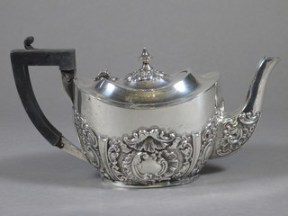 An Edwardian oval embossed silver bachelor's teapot, Birmingham 1900 8 ozs  ILLUSTRATED