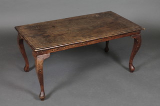 A rectangular Eastern inlaid hardwood coffee table raised on cabriole supports 35"