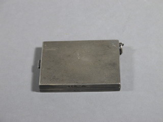 An Art Deco silver match slip with engine turned decoration,  London 1932 by the Goldsmiths & Silversmiths Company, 2 ozs