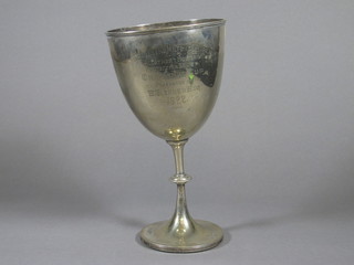 A silver plated goblet shaped trophy cup 11"