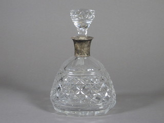 An oval cut glass decanter with silver collar, Birmingham 1929 by Mappin & Webb