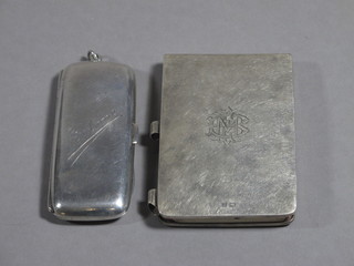 An Edwardian silver cheroot case, Chester 1904 and a silver stamp/note book case Birmingham 1916