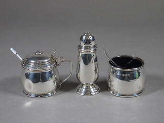 A silver 5 piece condiment set, Birmingham 1936, comprising  salt, pepper, mustard and 2 condiment spoons, complete with  blue glass liners 2 1/2 ozs