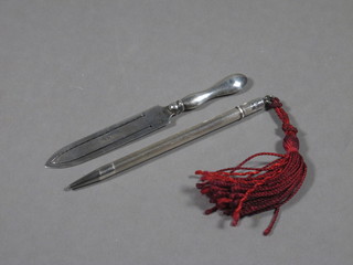 A silver bookmark in the form of a knife Birmingham 1914 and a silver cased propelling pencil