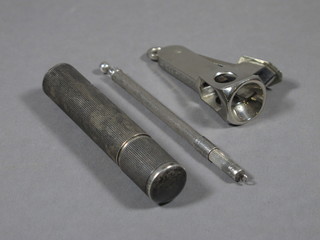 A silver cased lighter, a cigar cutter marked Hawker Siddley and  a silver swizzle stick