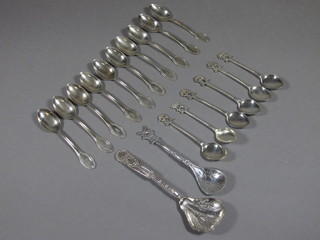 An Oriental white metal caddy spoon, a Dutch jam spoon, 2  Continental white metal coffee spoons and 6 Eastern white coffee  spoons decorated animals