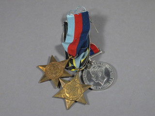 A group of 3 medals comprising 1939-45 Star, COPY of Air  Crew Europe Star and British War medal