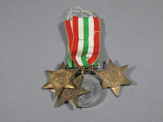 A group of 4 medals comprising Africa Star, Italy Star, France & Germany Star and Defence medal