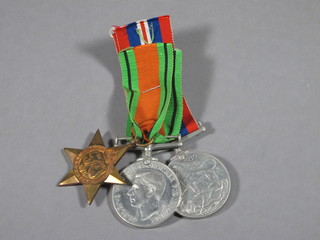 A group of 3 medals comprising 1939-45 Star, Defence medal  and British War medal