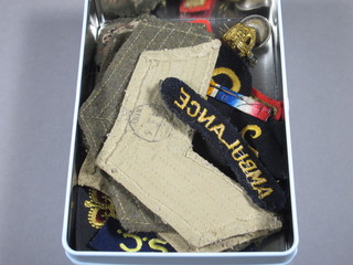 A collection of various cloth insignia