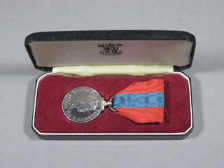 An Elizabeth II Imperial Service medal to Miss Gladys Timms,  boxed