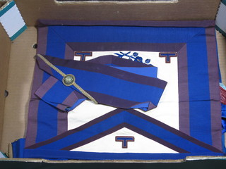 A quantity of Masonic regalia comprising Supreme Grand  Chapter Officer's apron and collar, Standard Bearer Mark Master  Masons Grand Officer's undress apron and collar - Deacon