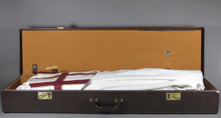 A Knights Templar tunic and mantel and a Knights Templar High  Priests mantel and mitre contained in a carrying case