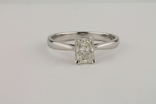 An 18ct white gold dress/engagement ring set a rectangular solitaire diamonds, approx 1ct