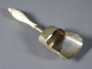 A Victorian silver caddy spoon with turned ivory handle,  Birmingham 1896