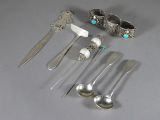 2 William IV silver fiddle pattern mustard spoons, London 1826  and 1829, a silver pusher, an Eastern silver paper knife and a  white metal bracelet together with 2 hat pins