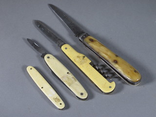 A Jack knife and 3 "bone" handled folding knives