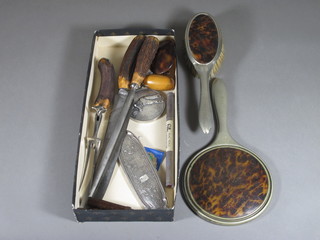 An oval silver clothes brush back, a 3 piece carving set, a 2 piece tortoiseshell and silver plated dressing table set etc