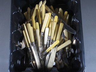 A quantity of ivory handled knives and forks etc