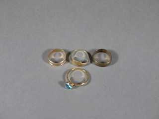 A 9ct gold signet ring and 3 gilt metal rings